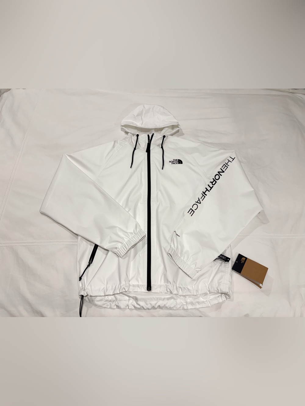 The North Face White Rain Jacket with Hood Novelty TNF - Picture 3 of 5